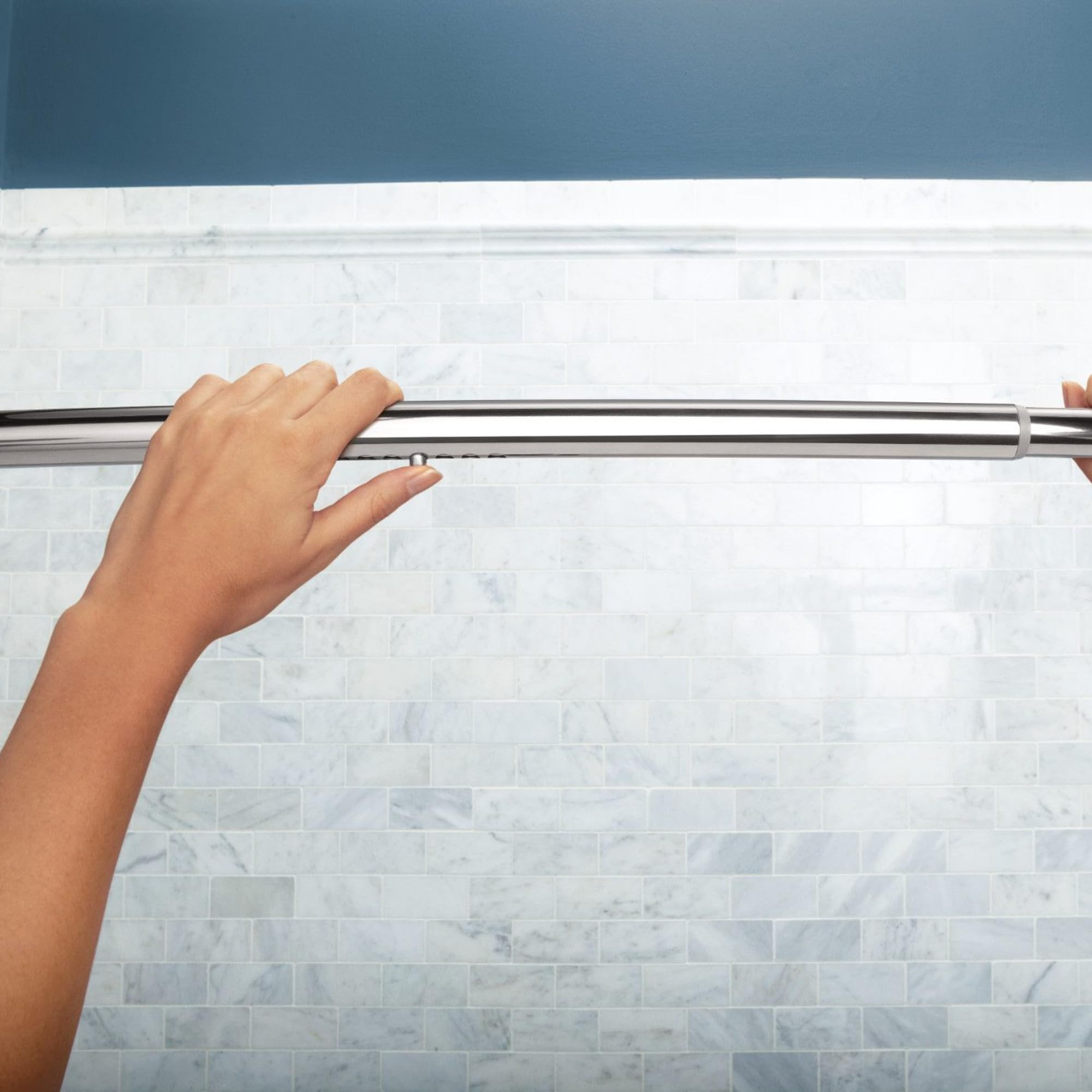 Moen curved rod installed in bathroom demonstrating tool-free setup benefit