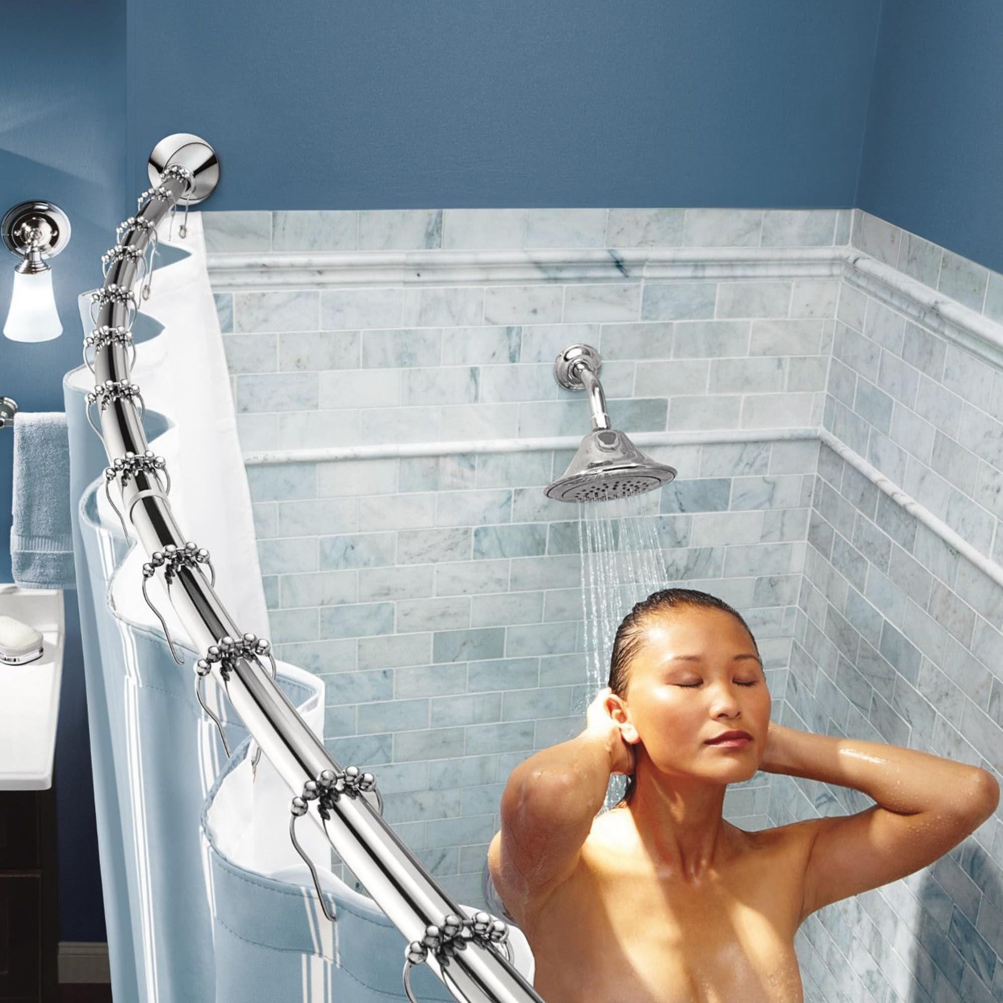 Moen curved rod packaged with components showing what’s included for installation