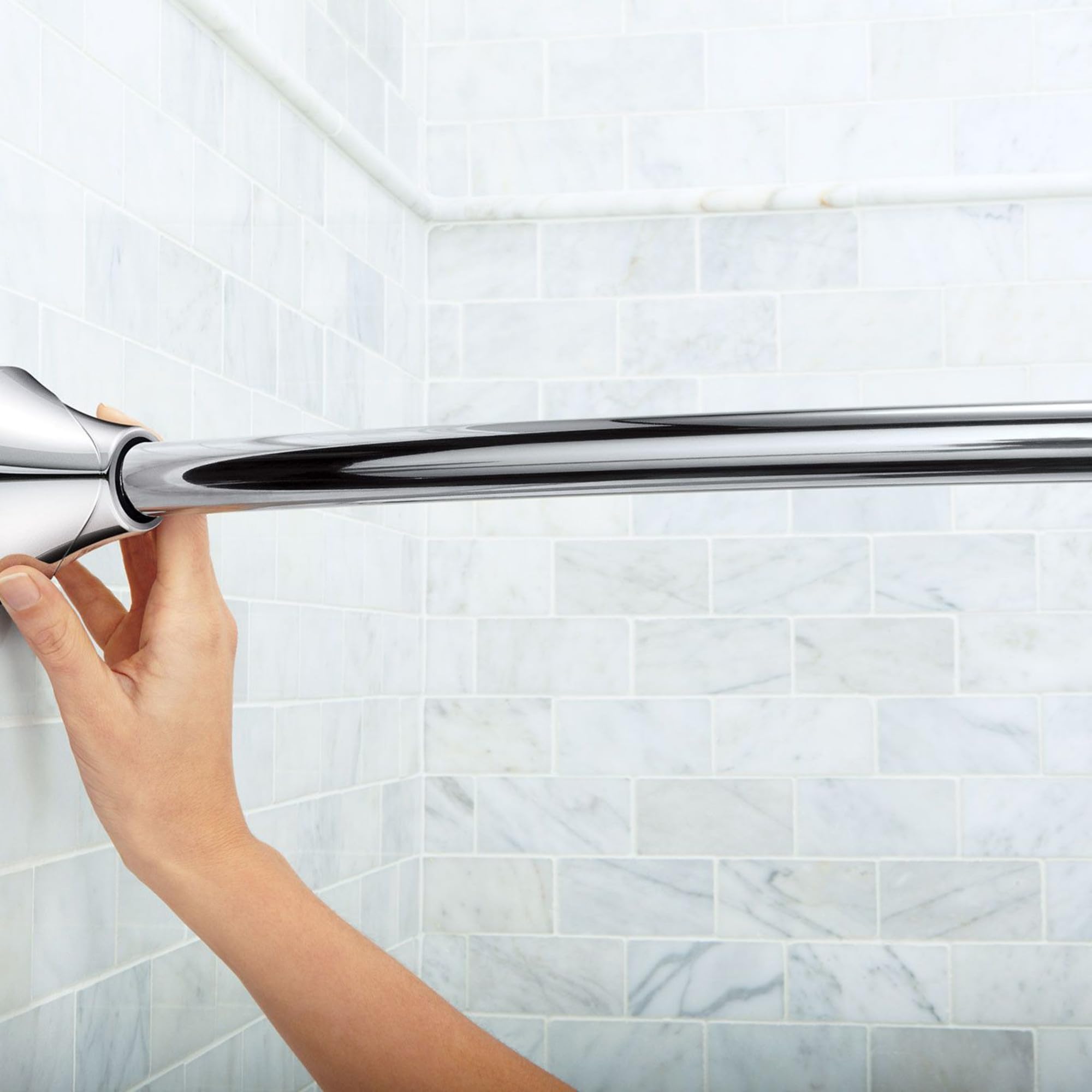 Moen curved rod tension adjustment closeup showing secure, drill-free fit