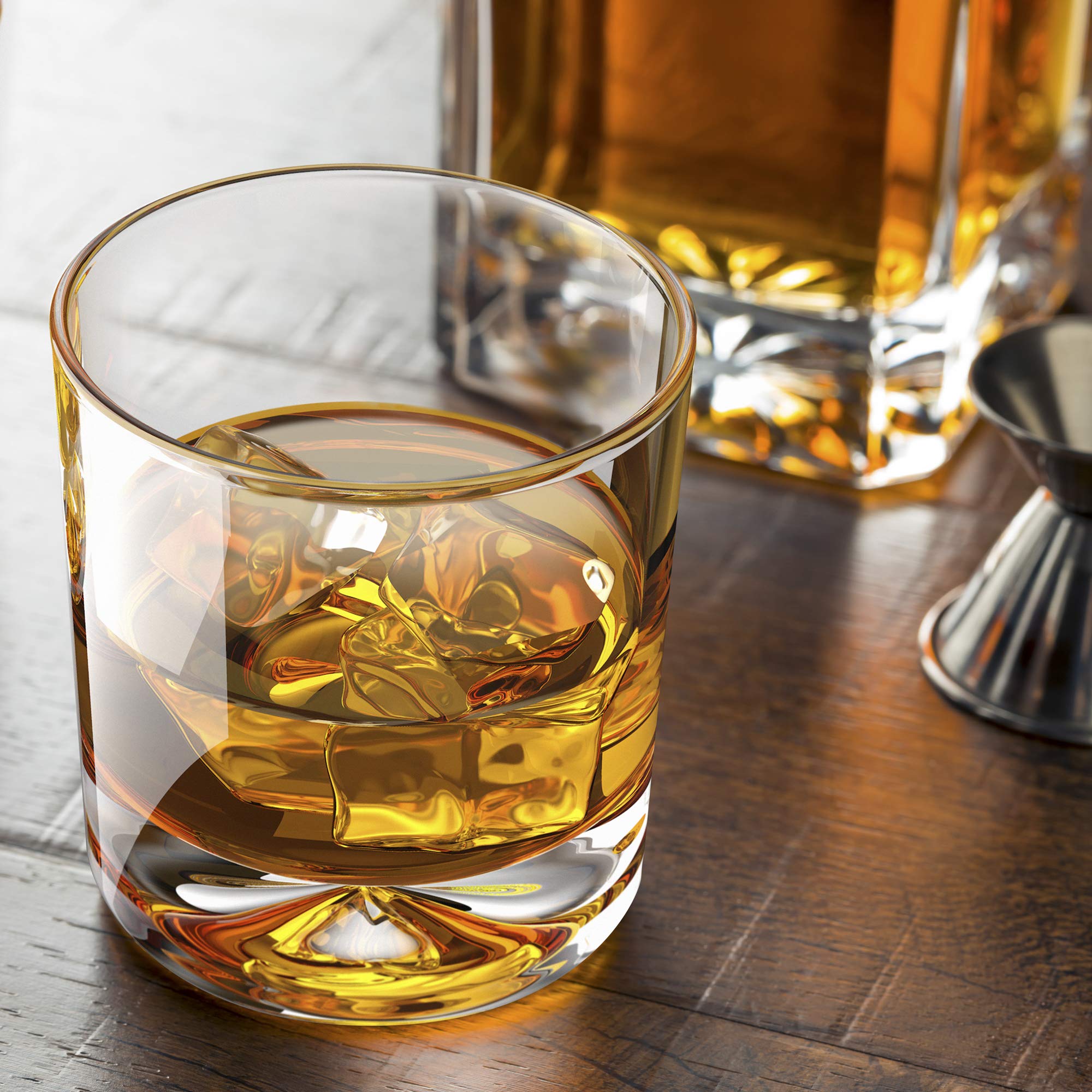 Mofado glass next to a whiskey bottle showing 12oz capacity scale