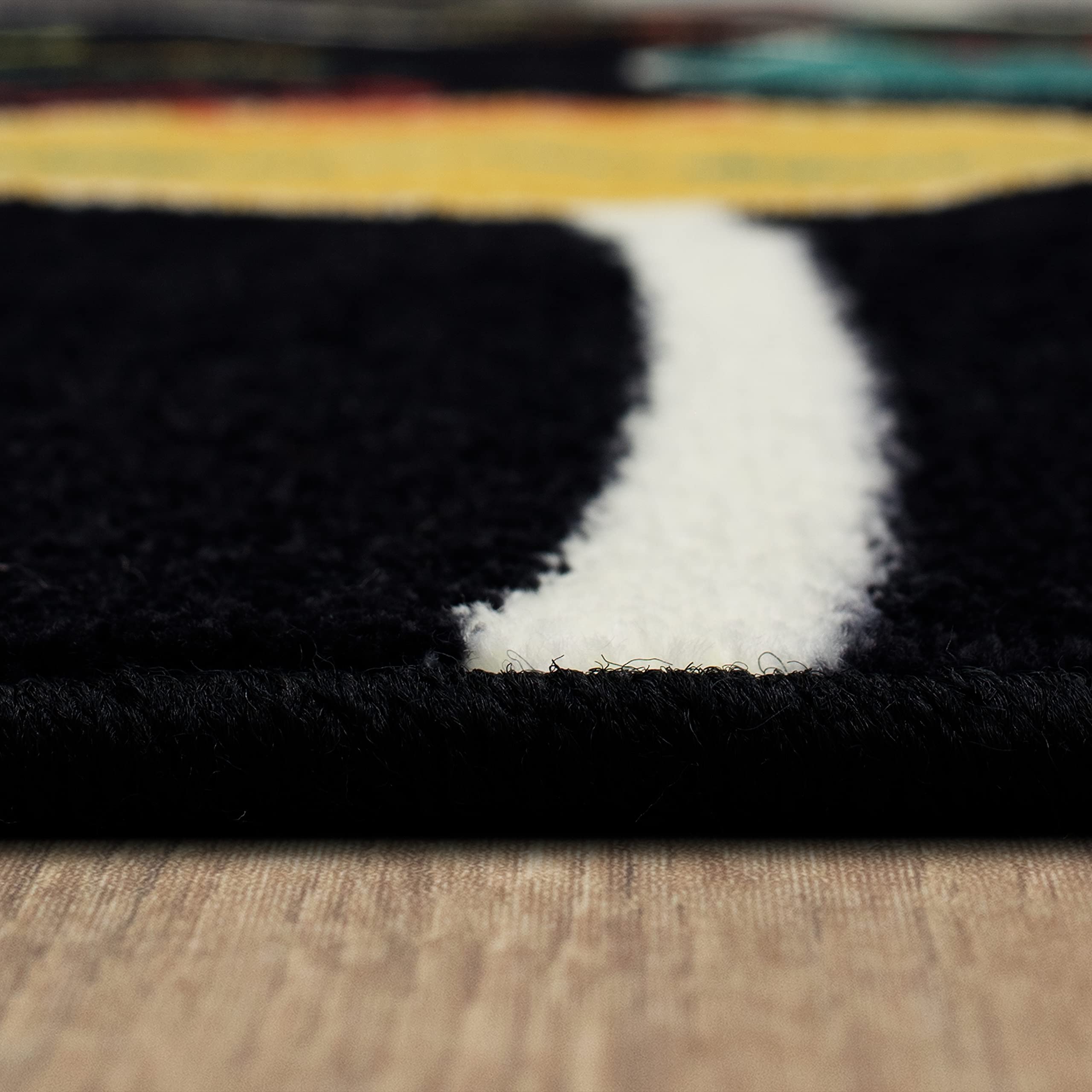 Mohawk Home rug next to toys showing real-world size and scale