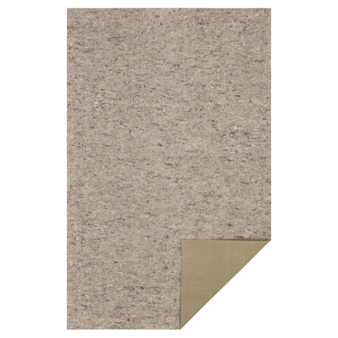 Mohawk Home pad beneath rug on carpet adding stability