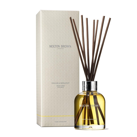 Molton Brown front packaging showing diffuser bottle and eight reeds, elevates décor
