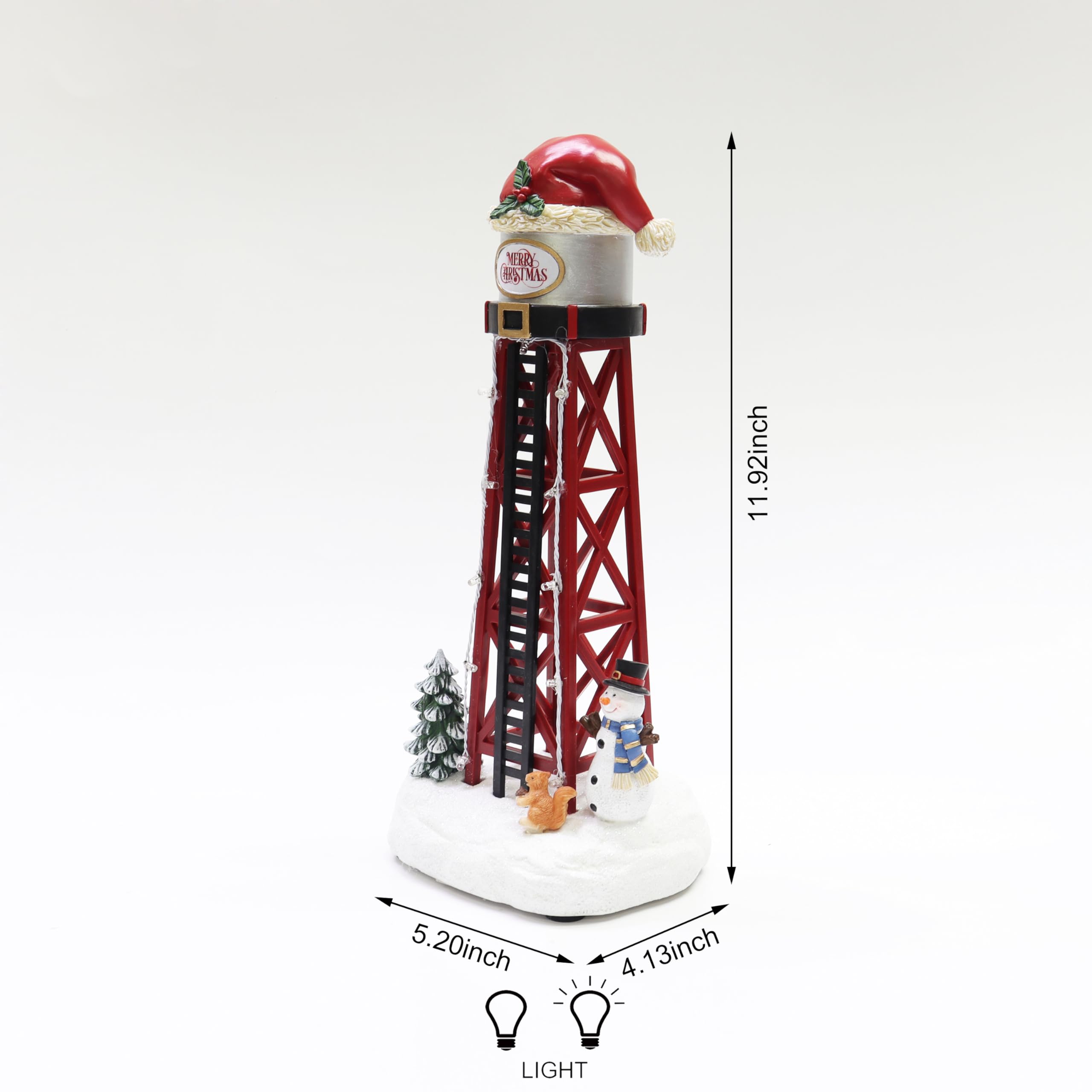 MOMENTS IN TIME water tower lit on a tabletop village, creates warm holiday ambiance