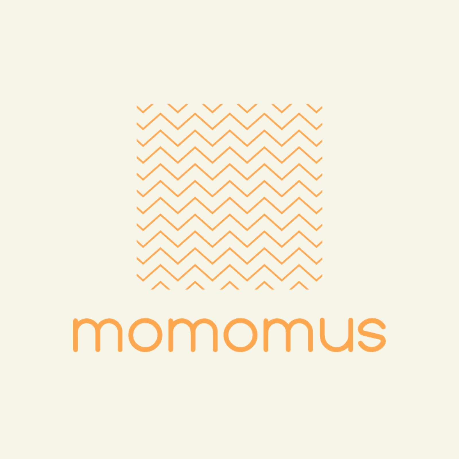 MOMOMUS blanket on grass at campsite showing multipurpose utility