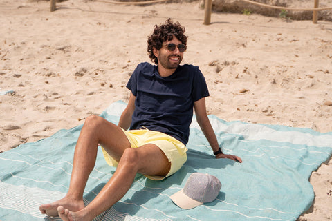 MOMOMUS lightweight blanket folded and packed for travel ease