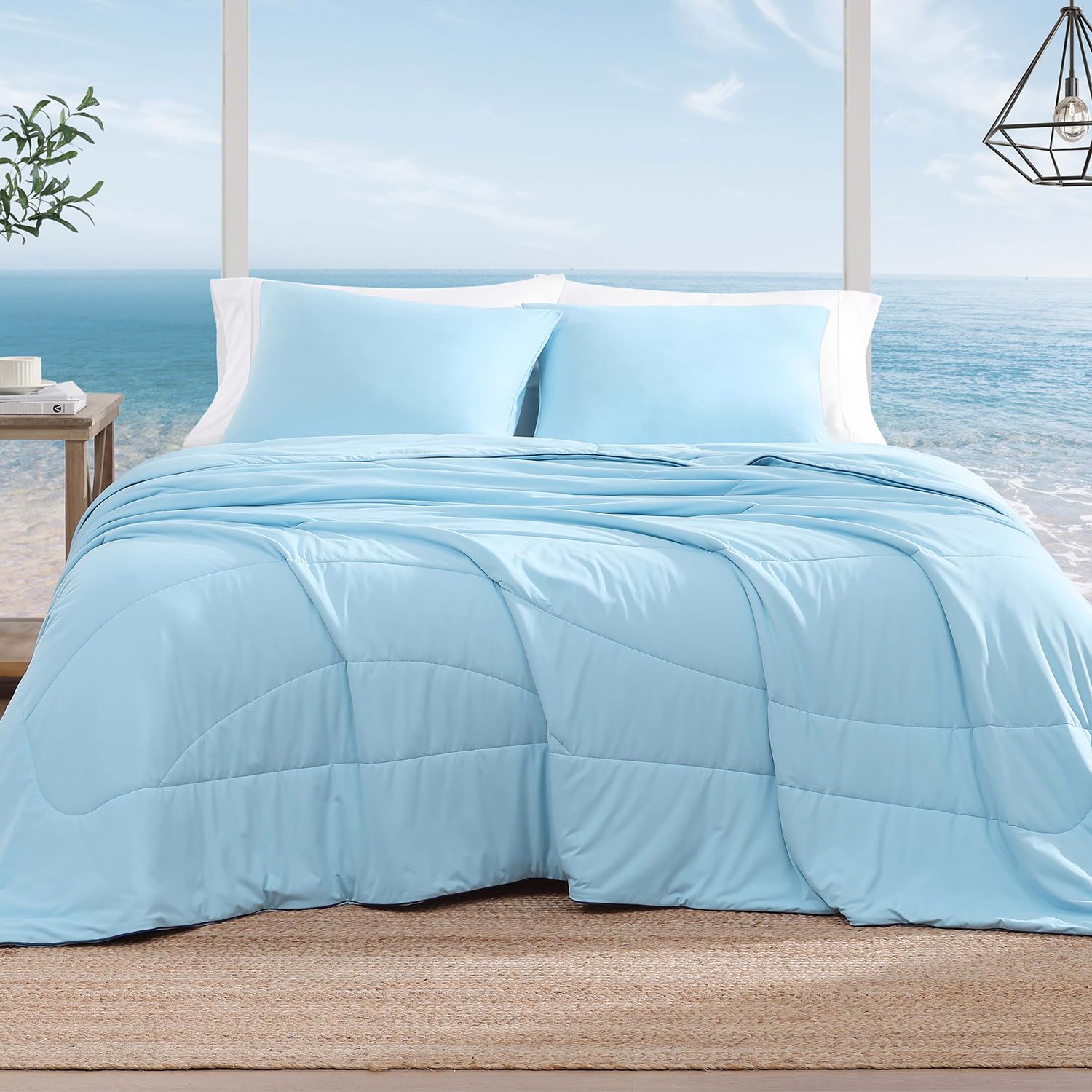 Monbix comforter front view showing cool, lightweight drape and breathable design