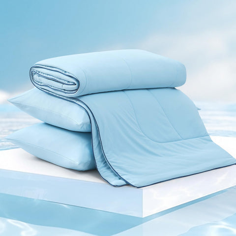 Monbix comforter used outdoors on chaise illustrating portable comfort and breathability