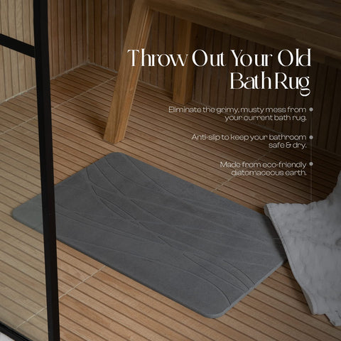 Mondano mat with wet feet stepping off shower demonstrating instant drying