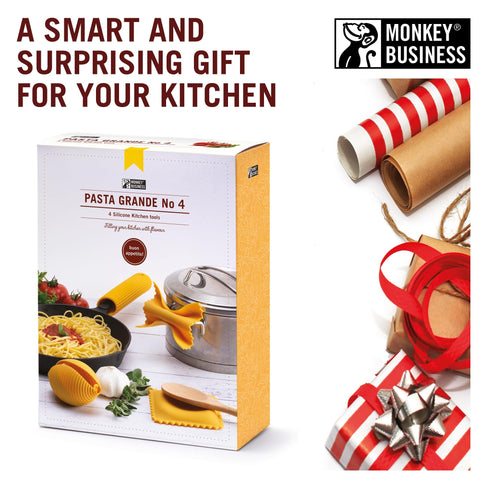 Monkey Business set next to utensils for scale showing compact gift box and space-saving design