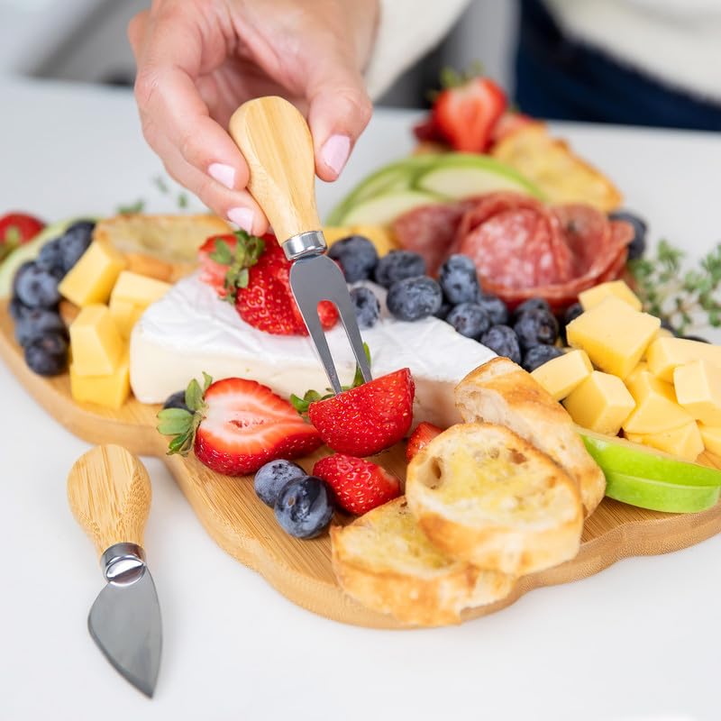 Monstera Home matching knife and fork set shown arranged on board for serving convenience