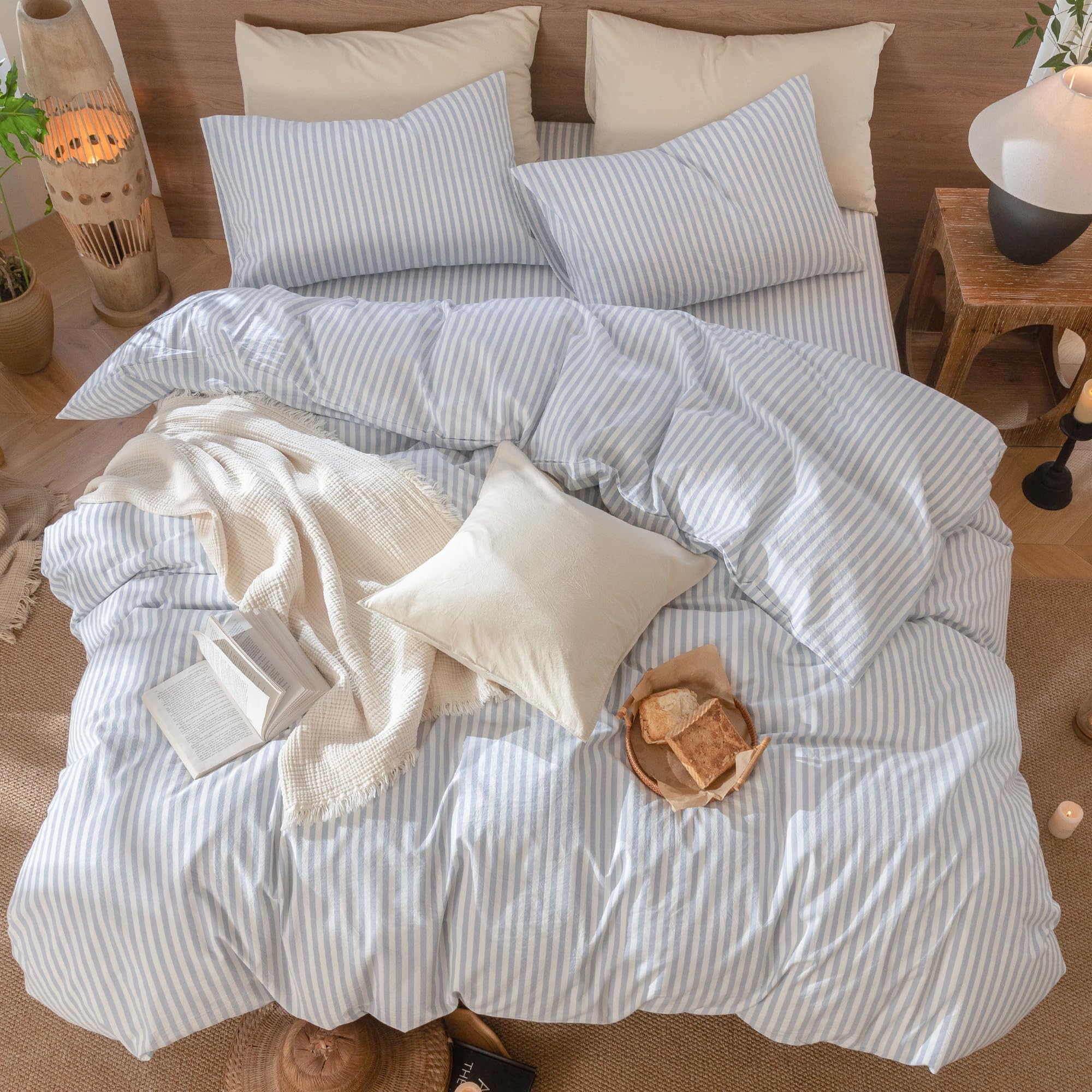MooMee styled bedroom with cornflower blue stripes adding relaxed comfort
