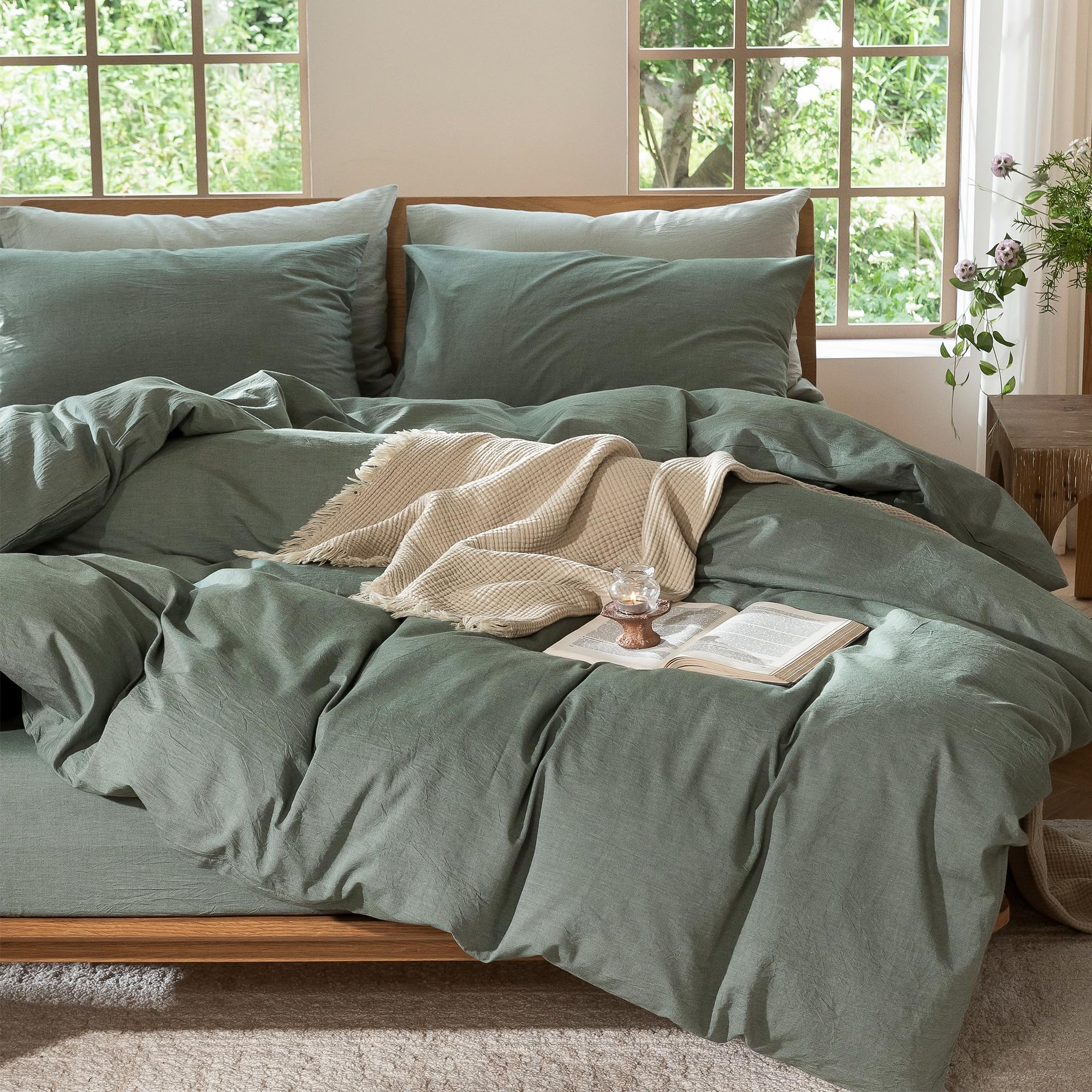 MooMee folded heathered green fabric highlighting linen-like look and easy layering