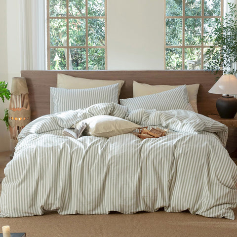 MooMee striped duvet front view showing calming sage white stripes and relaxed styling