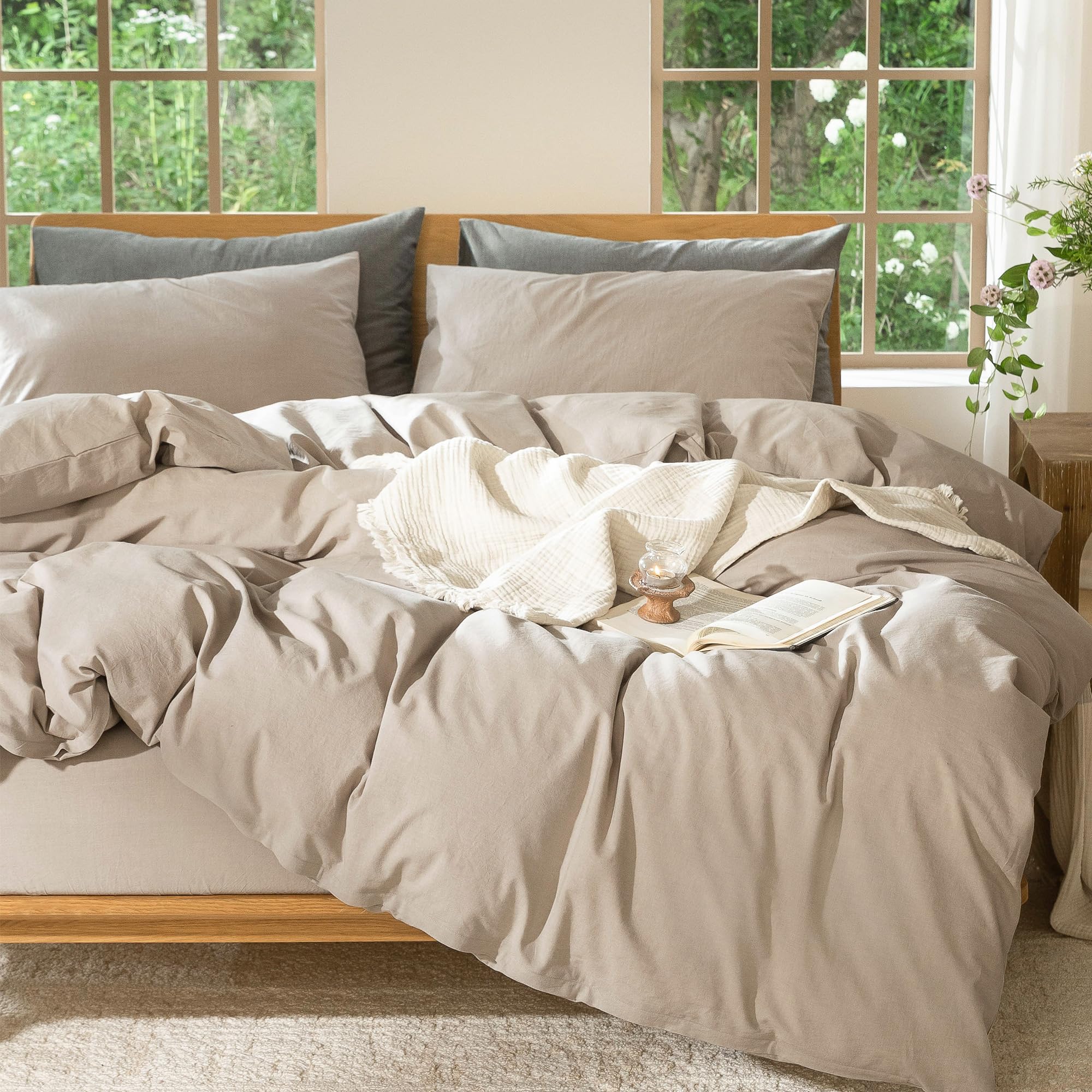 Folded stack of MooMee washed cotton highlighting relaxed, easy-care fabric