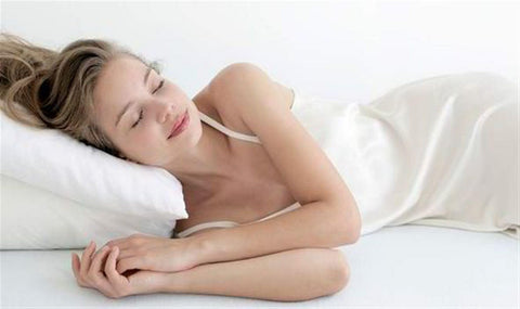 MoonRest bolster pillow styled on bed showing decorative impact and comfort