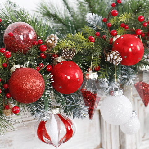 MoonXmas ornaments on decorated tree demonstrating classic red-white look for cohesion