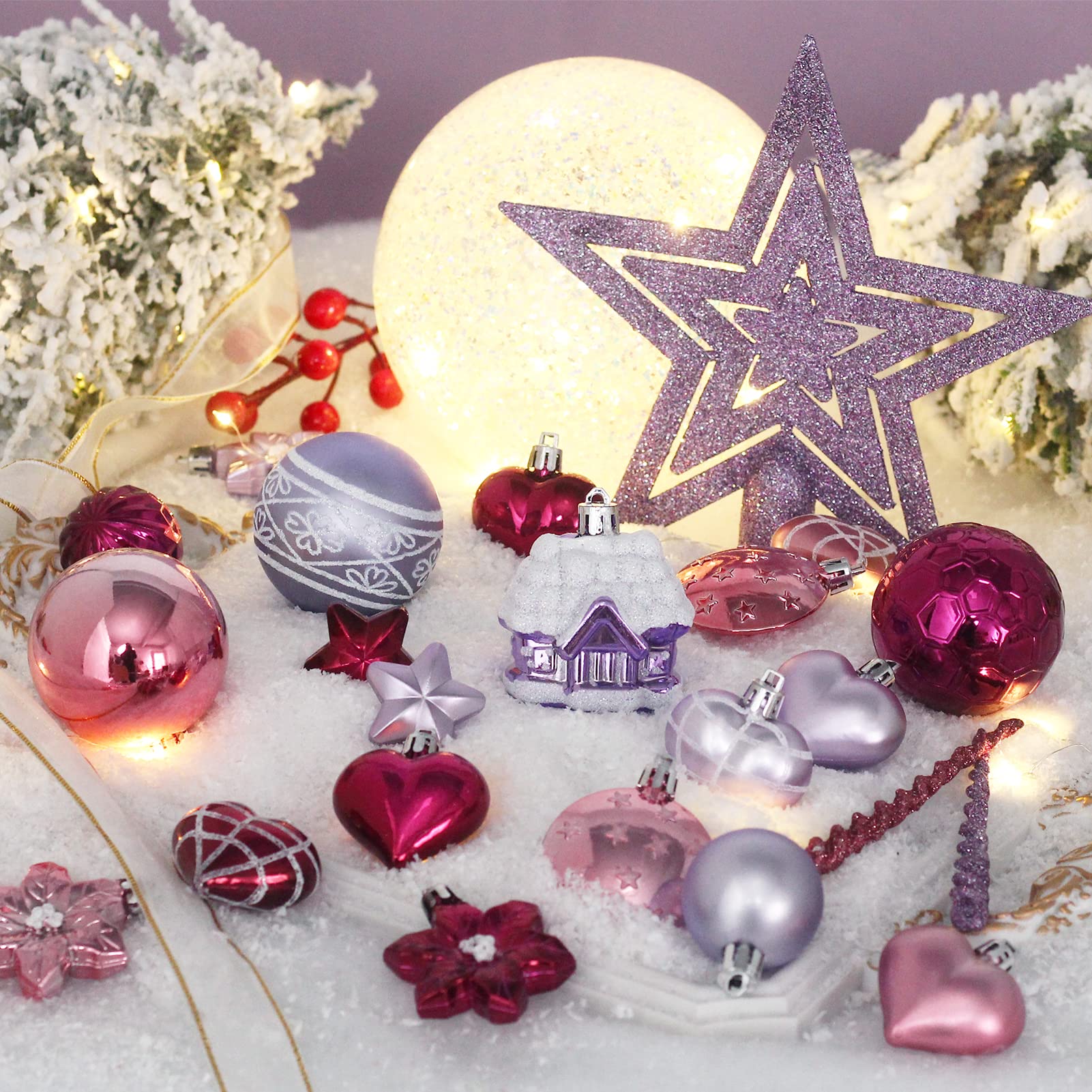 MoonXmas assorted ball sizes hung on a branch showing size variety benefit: fits many tree types