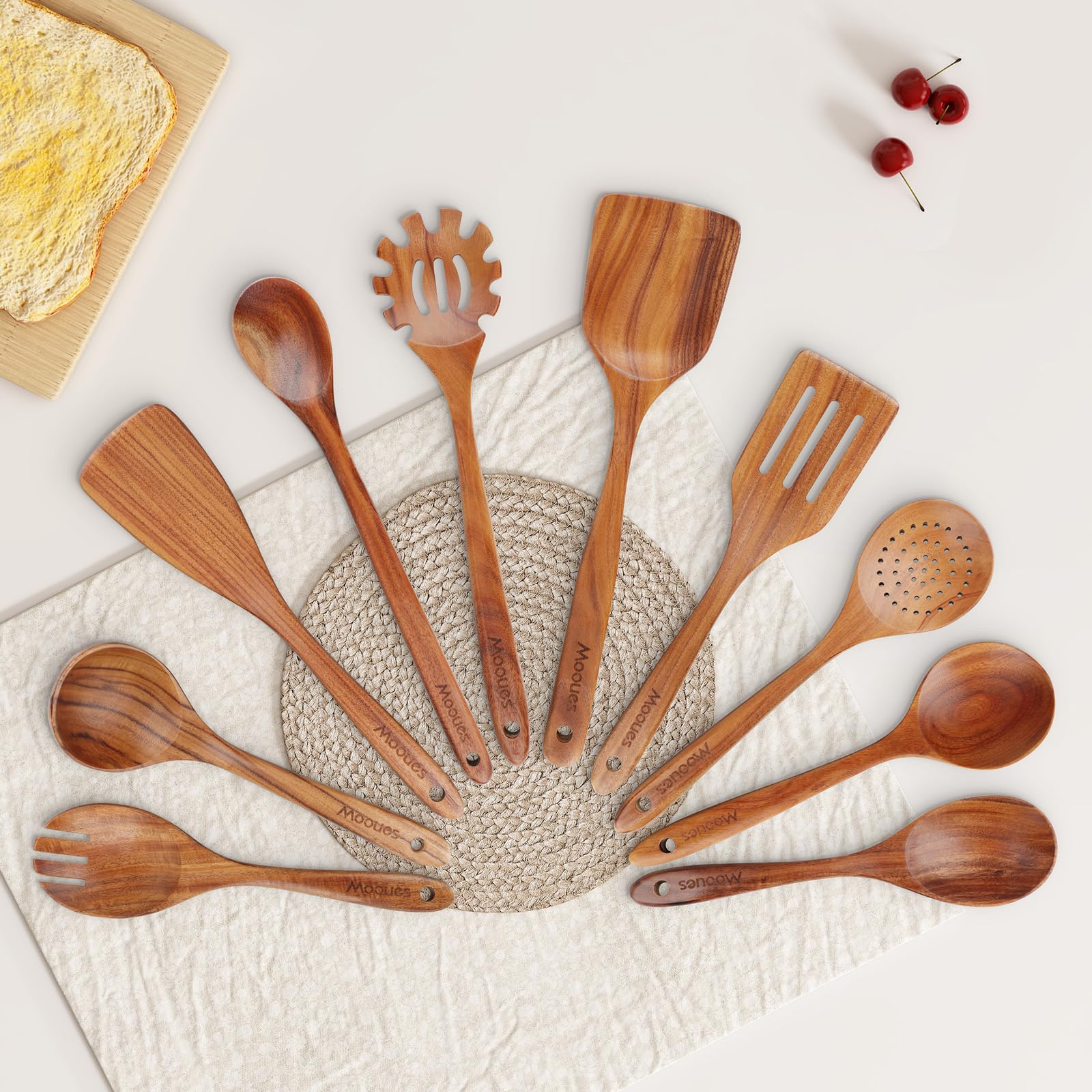 Mooues wooden utensils hanging in kitchen for easy access and organized storage