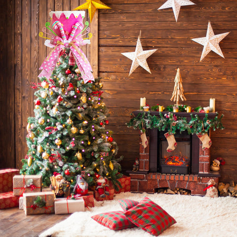 MOSHAKALA topper on mantel in holiday scene adding whimsical seasonal accent