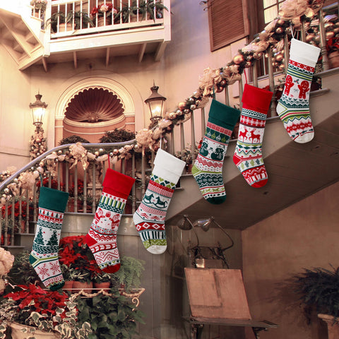 Mostop stockings in living room setting creating warm holiday ambiance