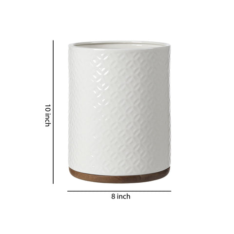 Motifeur in bedroom setting displaying decorative waste solution and versatility