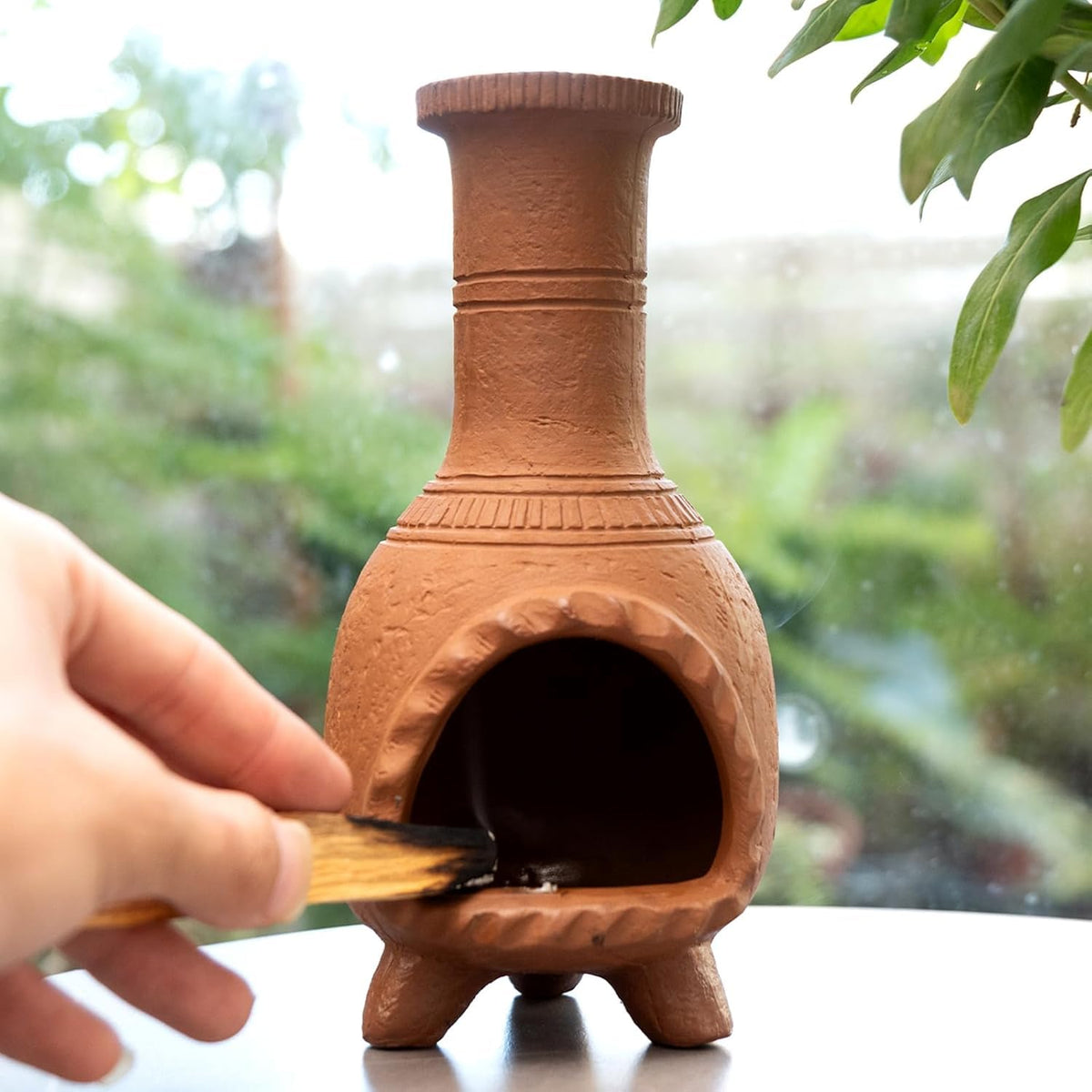 MOUGIGI front view of terracotta chiminea holder showing rustic charm and safe containment