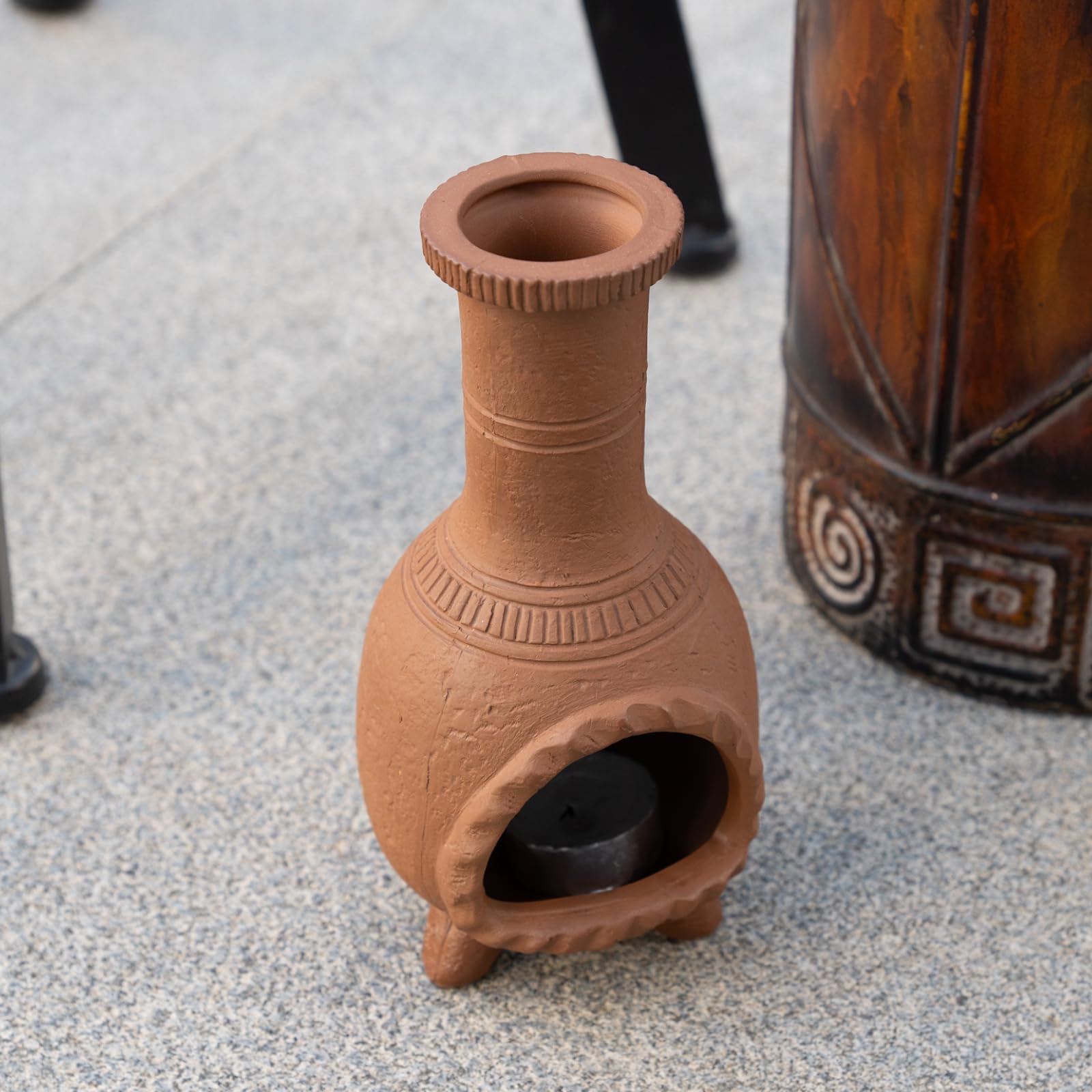 MOUGIGI holder in use with a burning palo santo stick releasing gentle fragrance
