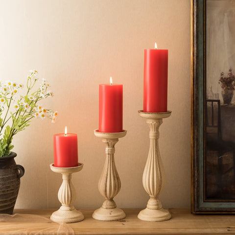 MOZEAL candles in wedding centerpiece adding elegant red accent