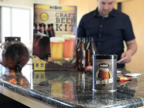 Mr. Beer Golden Ale hopped malt extract and components laid out for quick batch preparation and clarity