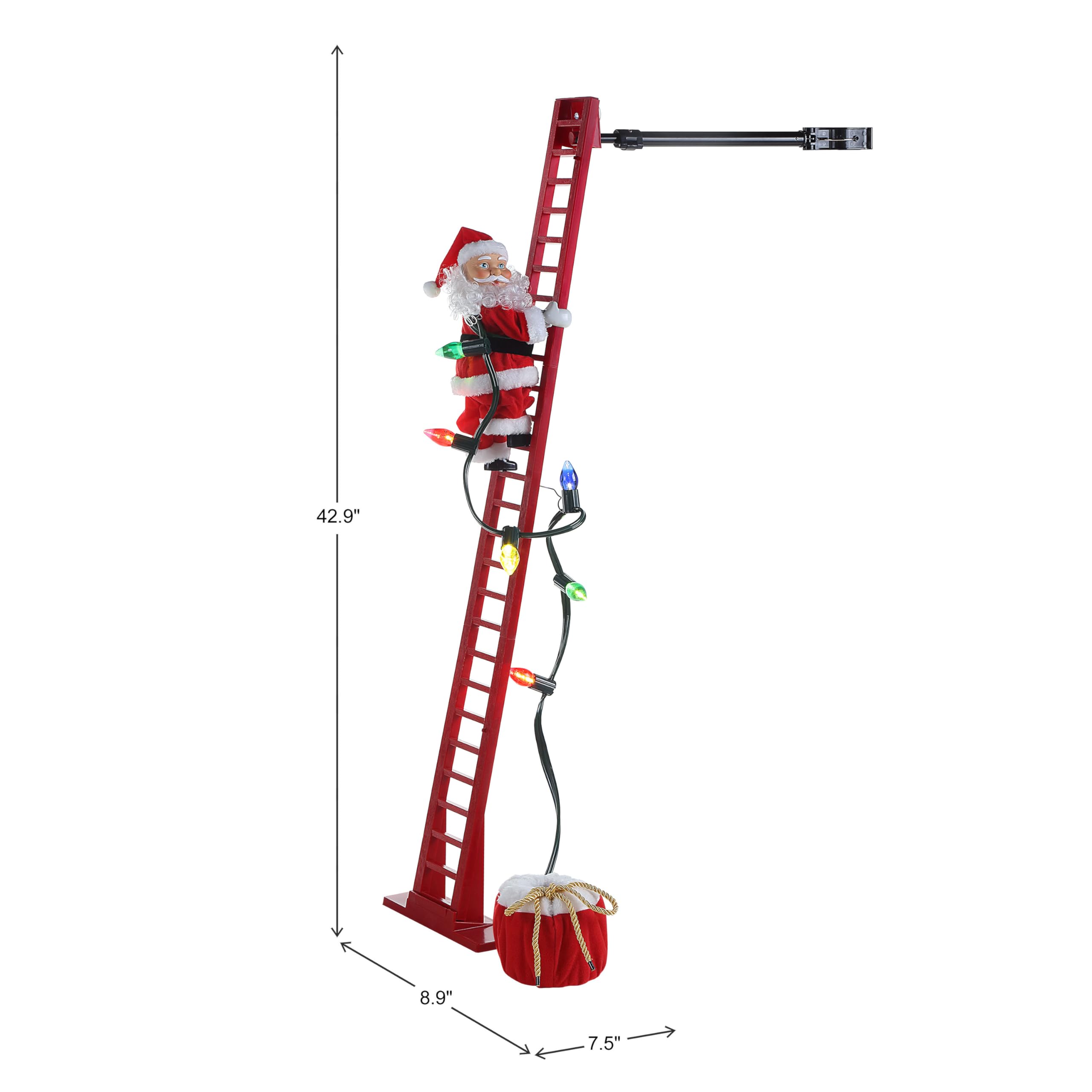 Mr. Christmas climber beside sofa to show 42-inch scale benefit: clear size reference