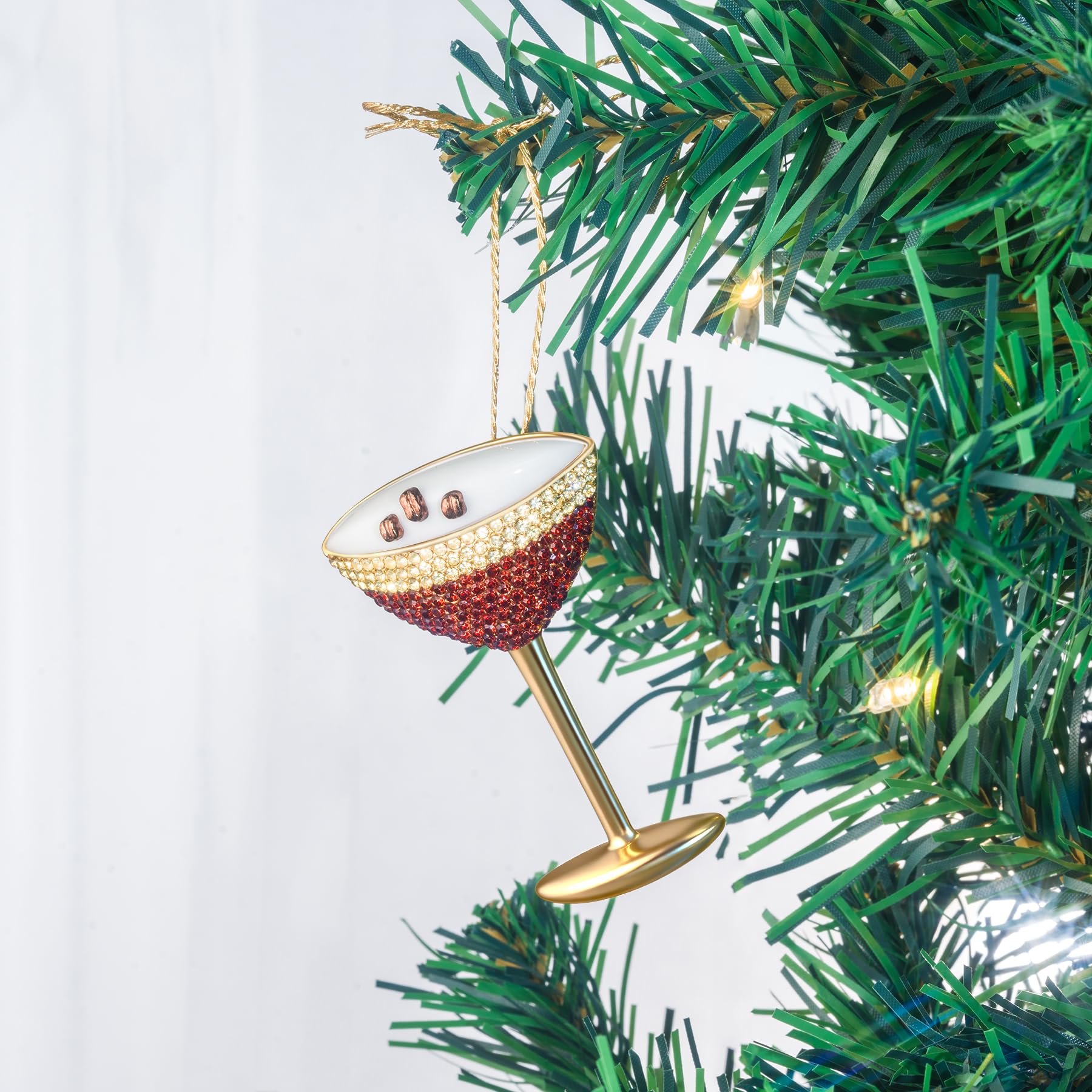 Mrchtmas espresso martini ornament in tree adding festive modern flair