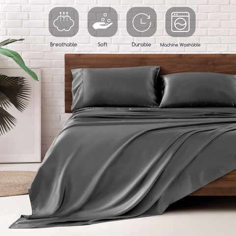 MR&HM styled bed with dark grey sheets giving a polished bedroom look