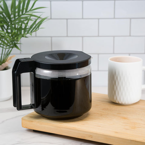 MRX Solutions carafe beside cups showing 1.25L capacity scale