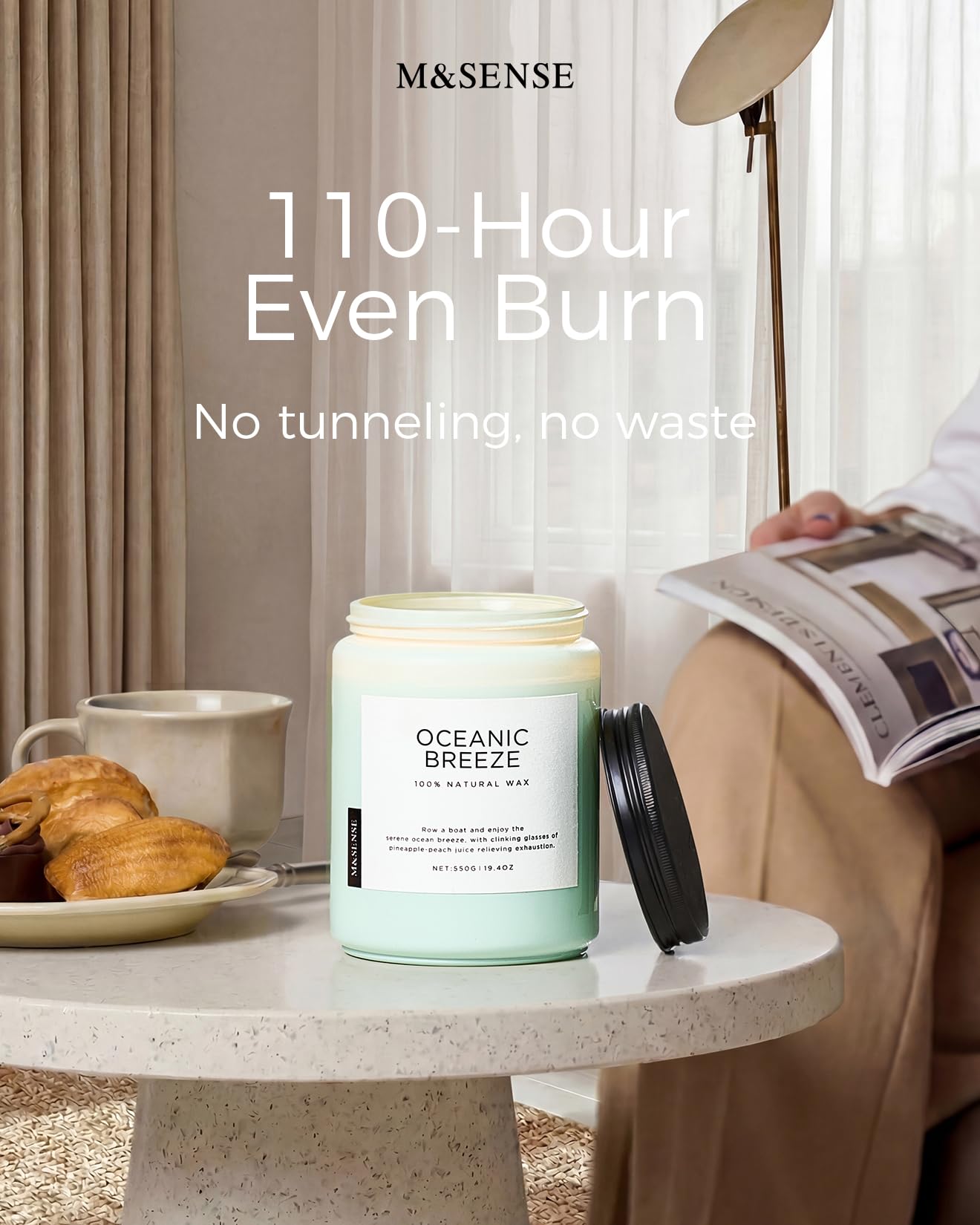 M&SENSE candle beside hand for size reference and generous 19.4 oz capacity