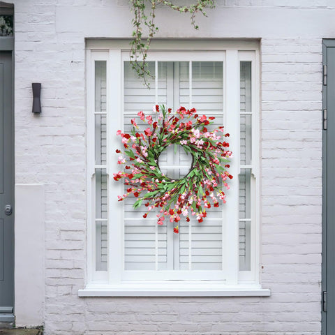 MSMUH wreath hung on wooden front door adding curb appeal