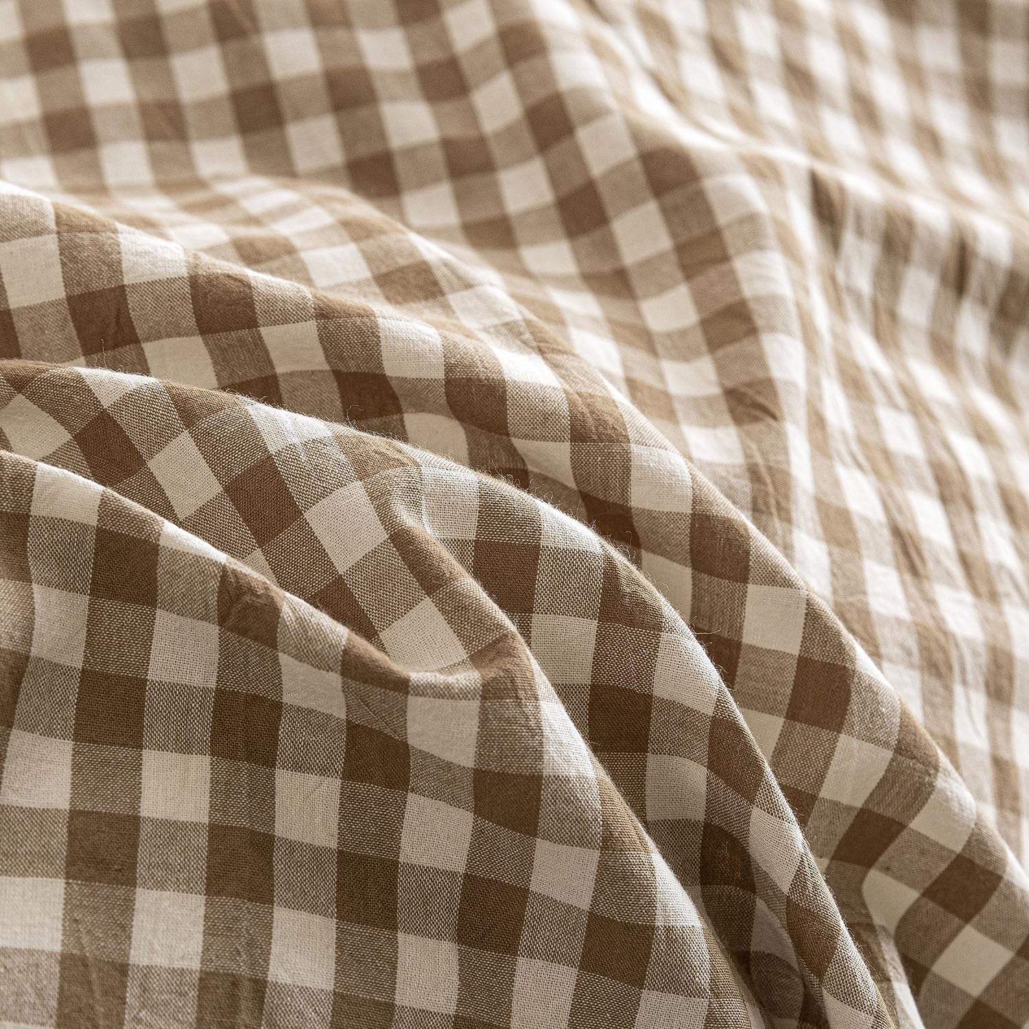 Mucalis interior corner tie detail securing duvet to prevent shifting overnight