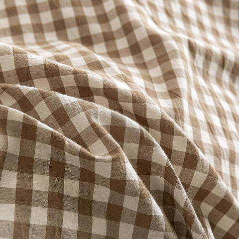 Mucalis interior corner tie detail securing duvet to prevent shifting overnight