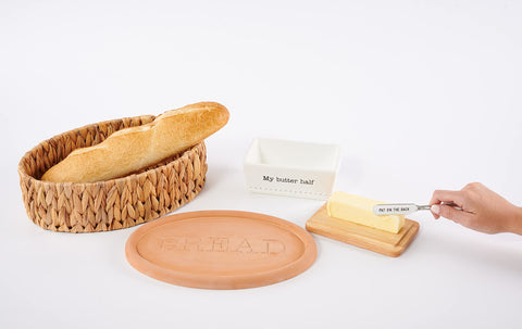 Mud Pie set beside a dinner plate showing compact 8.5x12.5 size
