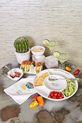 Mud Pie platter on table with hand shows scale and guest-friendly size