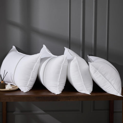MUFEW front packaging showing four true-to-size pillows and neat stacking benefit