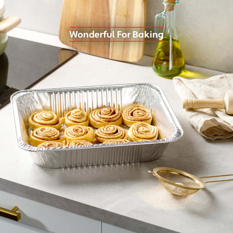 Munfix stack of pans beside a ruler for clear size and quantity comparison