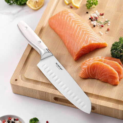 Musifan knives laid beside ruler illustrating compact sizes for easy storage