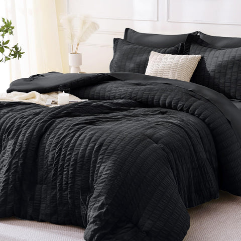 MUXHOMO comforter front view showing sleek black finish and refined look