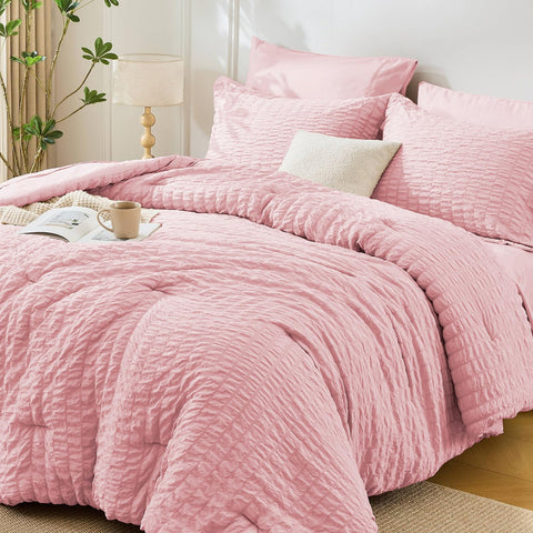 MUXHOMO front view of pink queen comforter set showing coordinated pieces and polished look