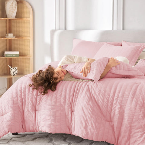 MUXHOMO size comparison on queen bed showing true-to-size 88 by 88-inch comforter fit