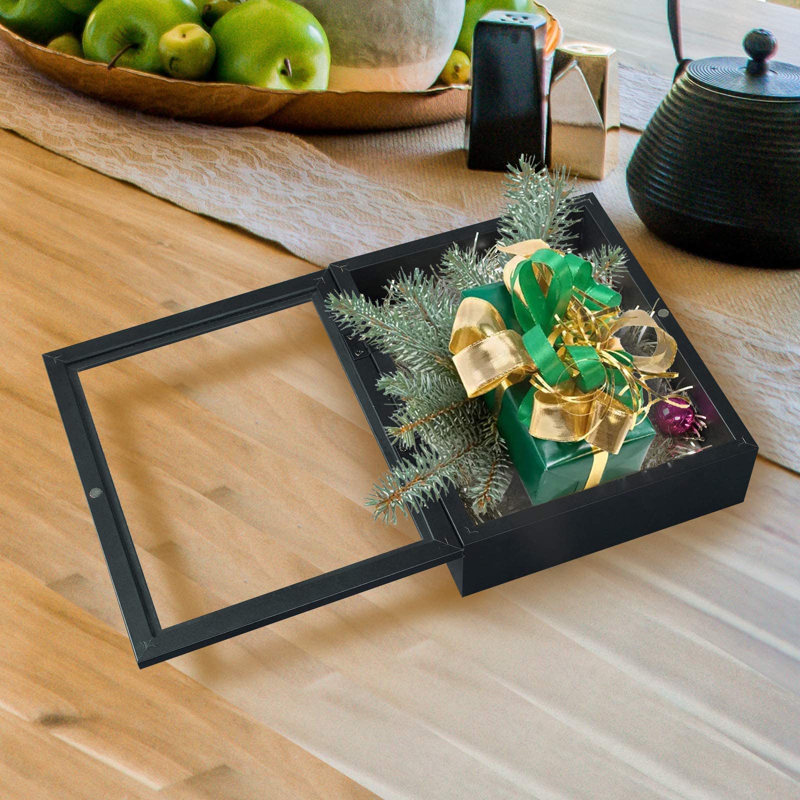 Muzilife frame held by hand to show scale and effortless wall placement