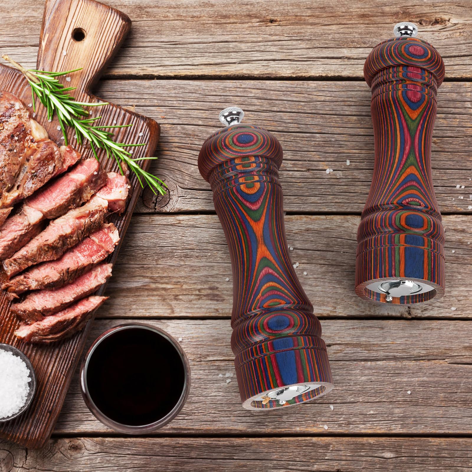 MYRAINBOW grinders seasoning a steak demonstrating even grind and enhanced meal presentation
