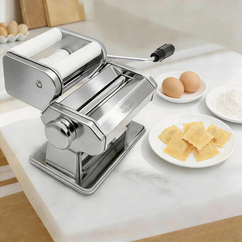 MZTOGR plated pasta machine on table beside served plate emphasizing homemade quality