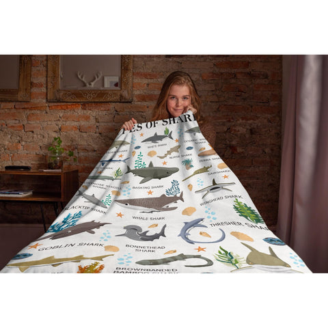 Nairatmya blanket with a small dog illustrating dual use as a pet-friendly throw